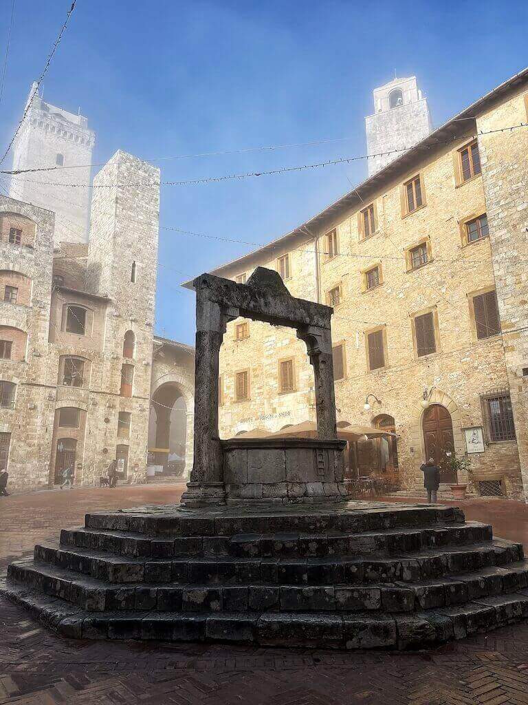 Piazza della Cisterna in one of the unmissable attractions in San Gimignano.