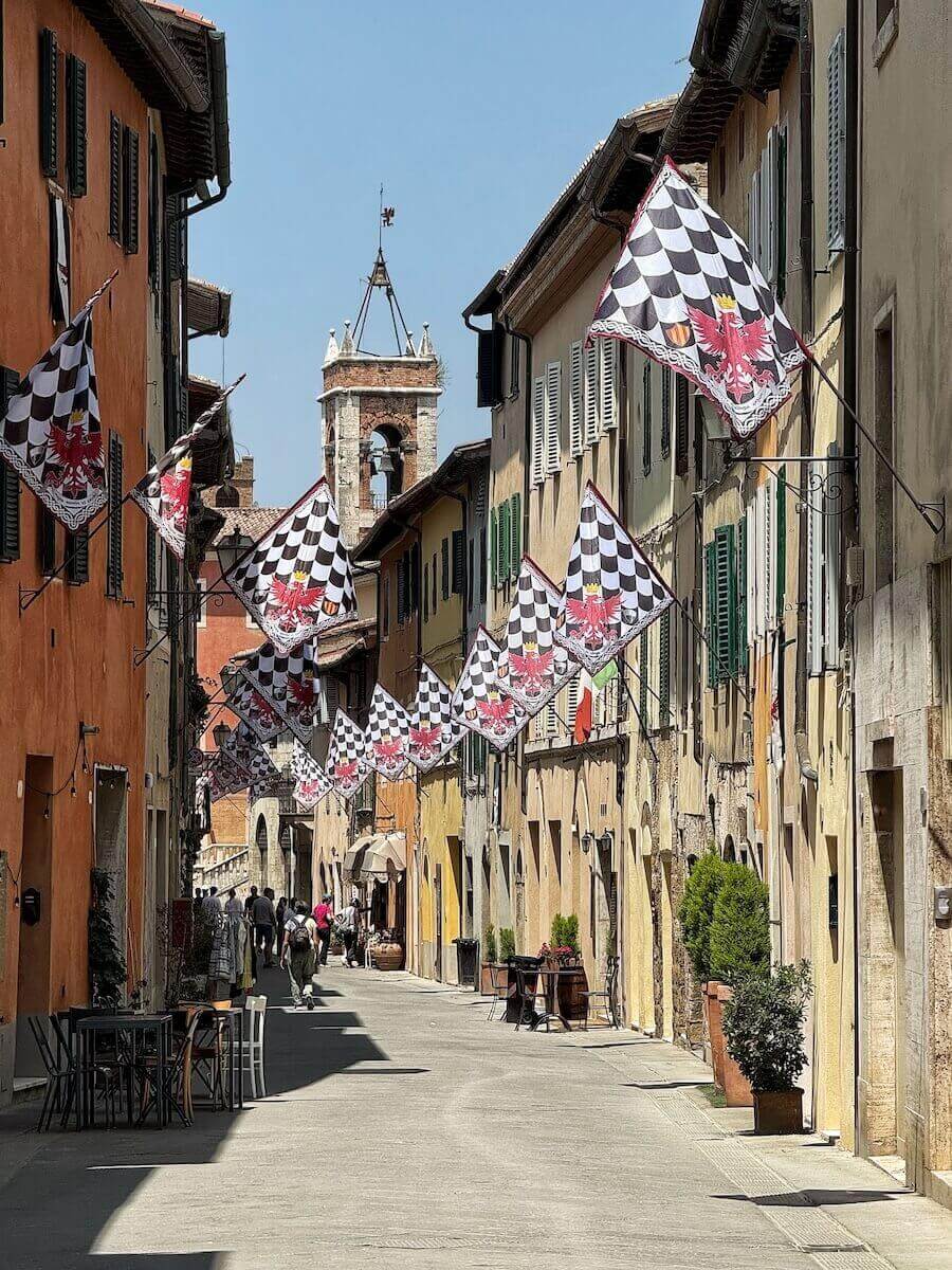 A festive San Quirico d'Orcia preparing for celebrations.