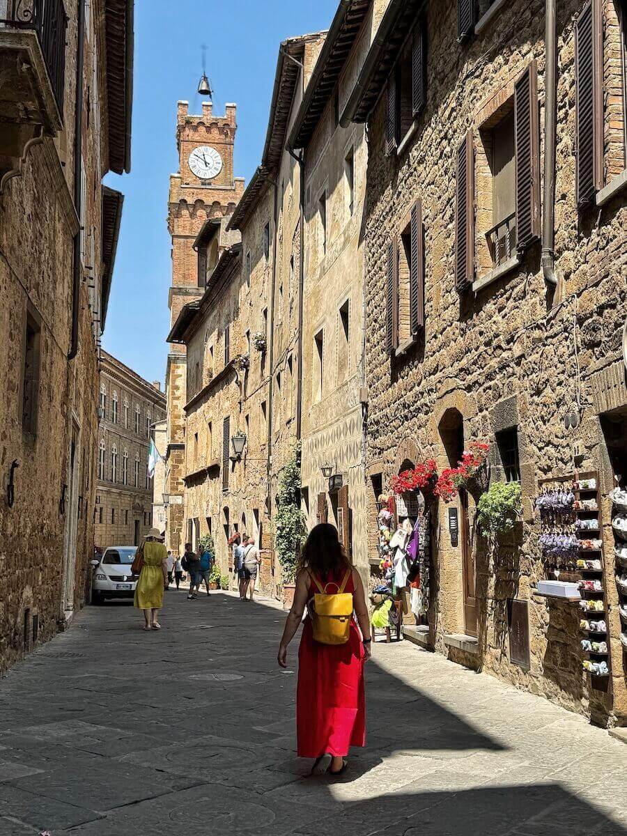 My sister enjoying a walk in the historic center of Pienza.