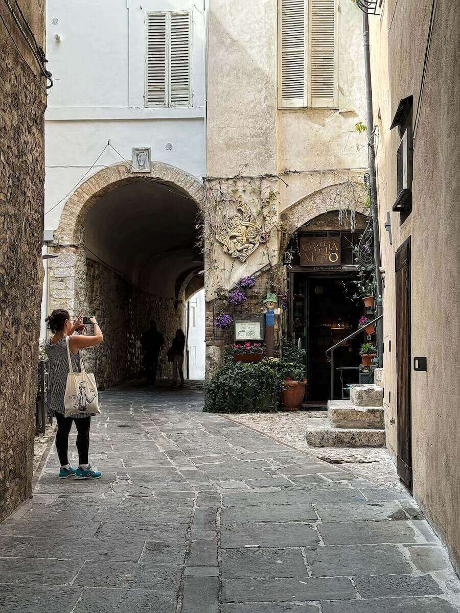 My sister taking a photo in Spoleto.