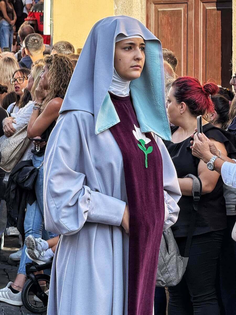 Young girl dressed as Rose during the historic parade in Viterbo.