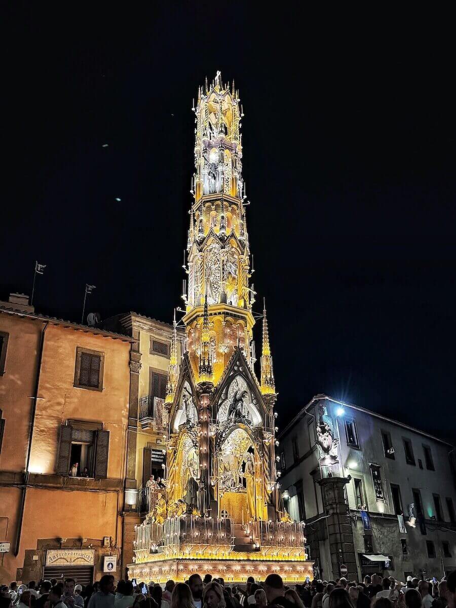 Macchina di Santa Rosa towering over the buildings of Viterbo.
