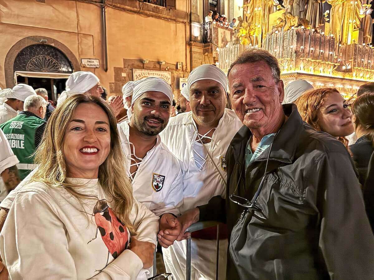 With the facchini di Santa Rosa in Piazza del Plebiscito.