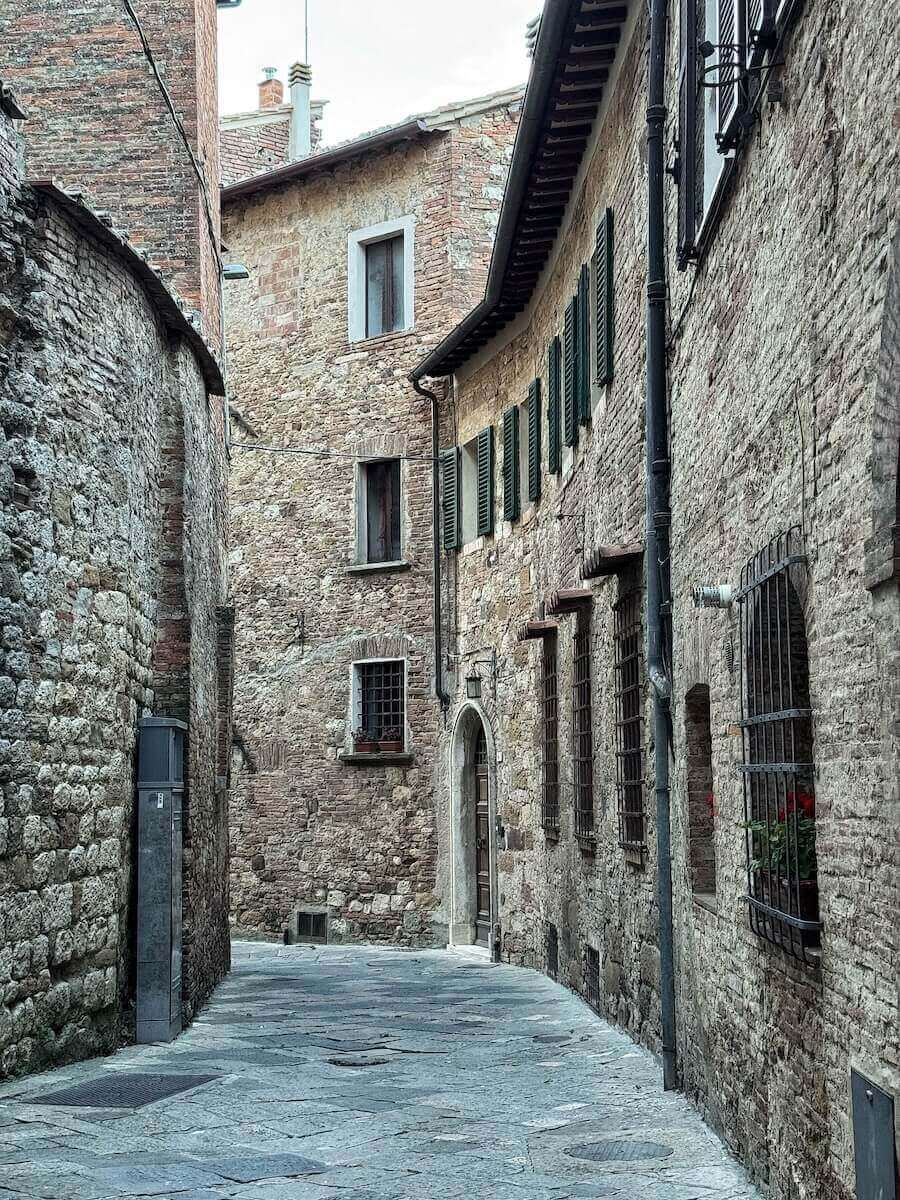 Narrow alley in the historic center of Montepulciano.
