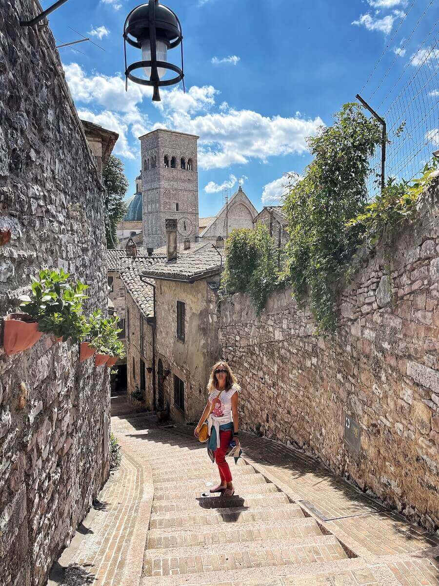 Exploring the center of Assisi, one of the best places to stay in Umbria.